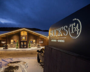 Resort front entry with sign in foreground
