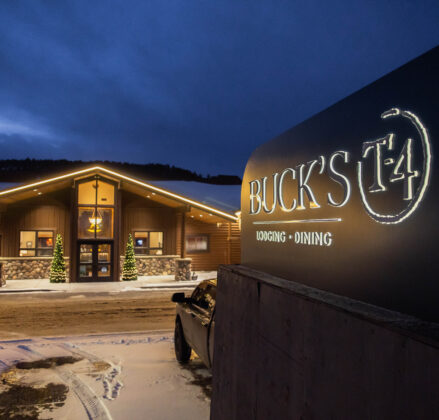 Resort front entry with sign in foreground