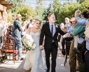 Bride and groom leaving the ceremony