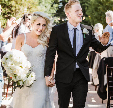Brinde and groom walking together